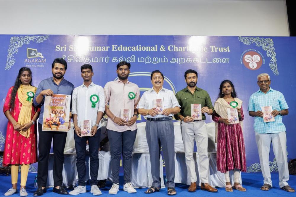 agaram-trust-actor-sivakumar-surya-karthi-photos